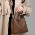 New women's bucket bag, genuine leather handbag, popular autumn/winter style, large capacity single shoulder, tote, and crossbody bag.