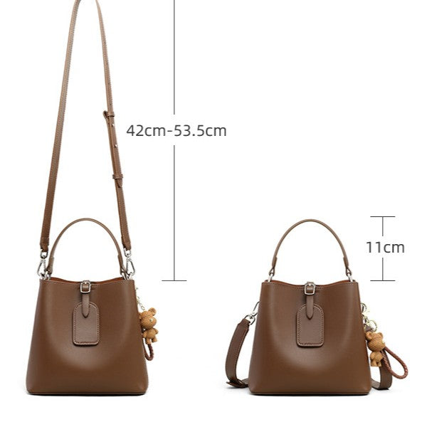 New women's bucket bag, genuine leather handbag, popular autumn/winter style, large capacity single shoulder, tote, and crossbody bag.